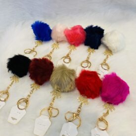 2883 llaveros pompom al azar