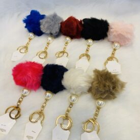 2884 llaveros pompom al azar