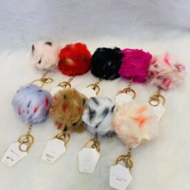 2885 llaveros pompom al azar