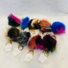 2886 llaveros pompom al azar