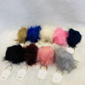 2888 llaveros pompom al azar