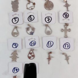 2409 dijes aceros al azar surtido